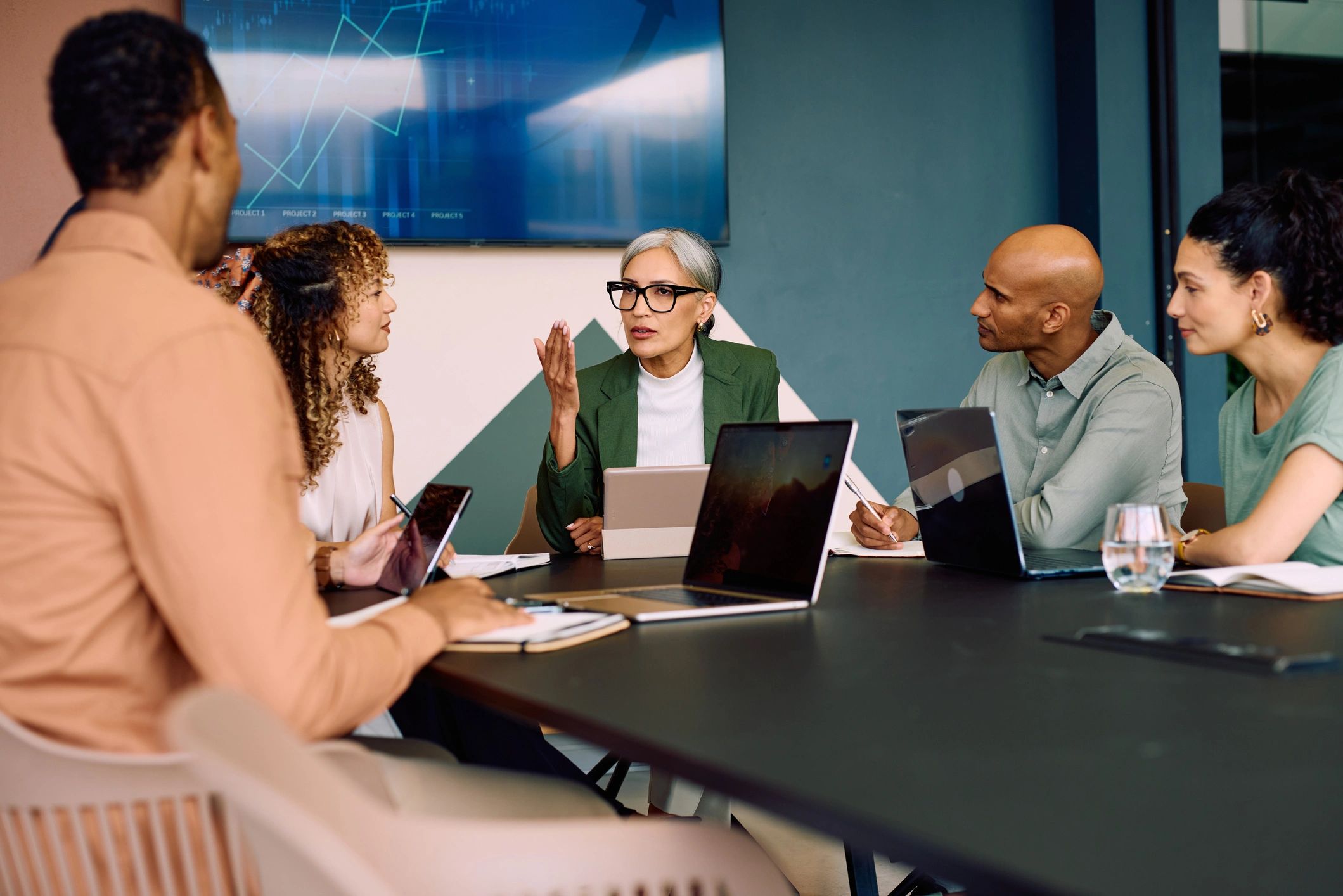 Professionals collaborating around a conference table